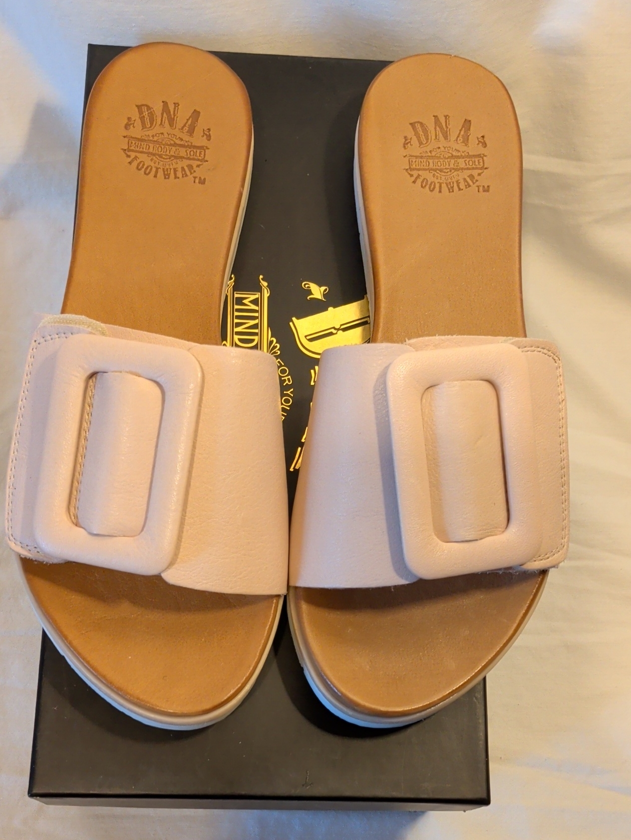 Womenâs Slide Sandals In Blush With Buckle Accent